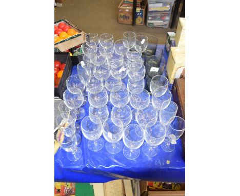 Quantity of wine glasses and beer mats