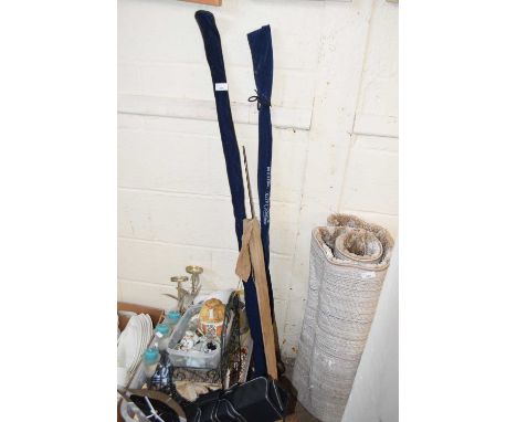 A group of three fishing rods