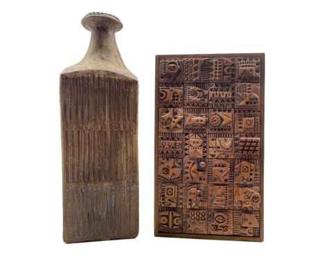 Ron Hitchins (British 1926-2019): A framed wall plaque depicting twenty-eight terracotta square panels, having relief and imp