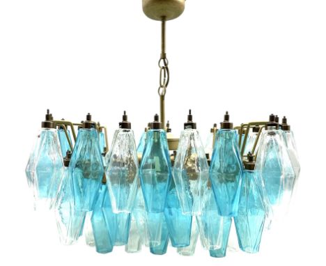 Murano Poliedri chandelier designed by Carlo Scarpa for Venini, the tiered gilt metal frame supporting Murano clear and blue 