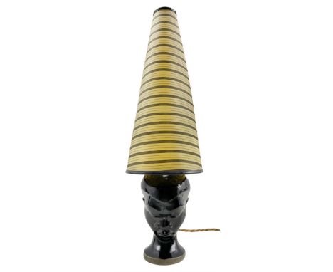 1960s Dartmouth Pottery table lamp in the form of a female head with conical striped shade, H58cm overall