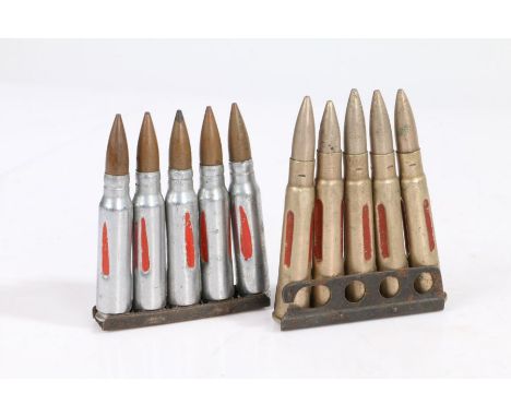 A 5 round charger clips of 7.62 Drill/Training ammunition, together with a 5 round charger clip of .303 Drill/Training ammuni
