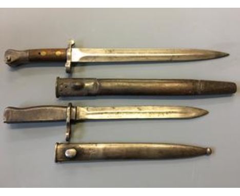 WWI bayonet in sheat, by Wilkinson, London, together with other WWI bayonet in sheath.
