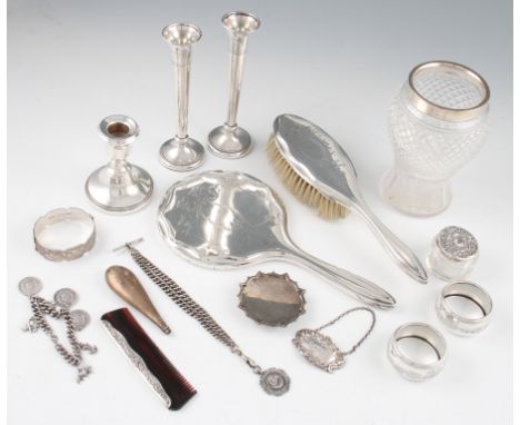 A collection of hallmarked silverware, to include a Victorian Gothic design pin dish, hallmarked Birmingham 1898, a candlesti