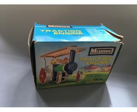 A boxed Mamod Tractor Engine.