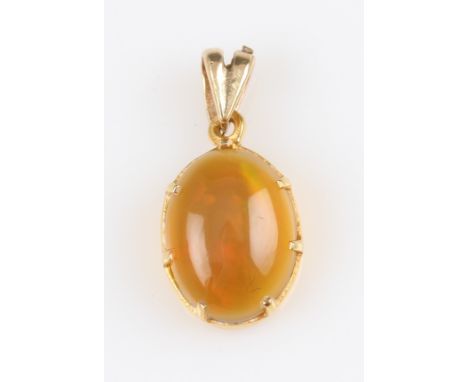 A fire opal pendant, set with an oval fire opal cabochon, measuring approx. 12x9mm, in unmarked yellow metal.