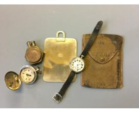 A WWI soldiers bronze mirror, 1904-1916 P.S.Hale, trench art lighter, a compass, and a Ingersoll wristwatch.