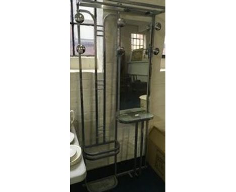 A chrome 1970's style hat and coat stand with fitted mirror.
