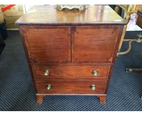 A Georgian mahogany chest commode raised on bracket feet. with fitted white pot,