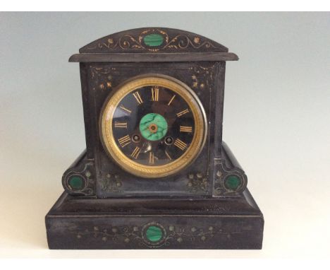 A black slate ChVcne 6849 mantel clock with green marble inlay design.