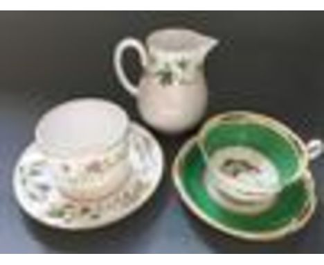 A 27 piece Royal Worcester tea set together with an 18 piece Grafton china and sons tea set.