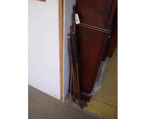 Vintage wooden gold clubs (7). 