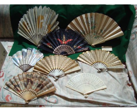 A selection of vintage fans to include two advertising examples from Le Pre-Catelan-Armenonville-Cafe de Paris circa 1910, an