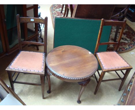 An occasional table, two chairs and a fold out card table.