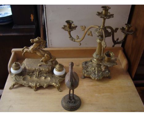 Metalware to include a brass equestrian prancing horse double inkwell and pen/letter holder, a brass three branched candelabr