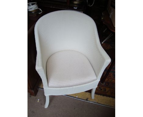 A Lloyd Loom white painted wicker commode chair.