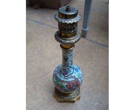 A 19th Century famille rose baluster vase, well converted to a table lamp with French brass mounts. 