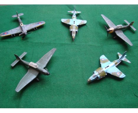 Two Dinky Toys 'Harrier' jump jet planes (model 722), with landing gear mechanism together with a Dinky Toys 'Junkers' aircra