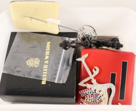 A mixed lot including a Butler & Wilson brooch depicting a lady walking a dog, an Art Deco cigarette case, stone set yellow m