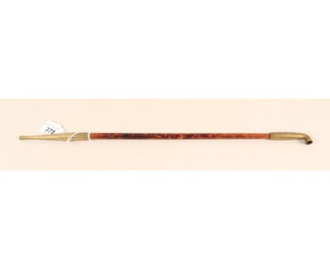 A Chinese wood and brass opium pipe