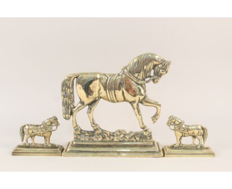 A brass trotting horse doorstop plus a pair of brass horse mantelpiece ornaments