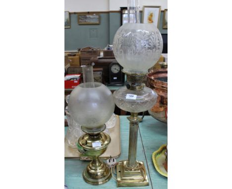 A brass Corinthian column oil lamp (converted) plus a brass oil lamp
