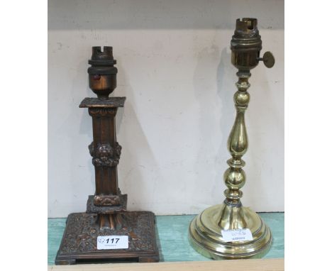 An Edwardian bronzed brass table lamp decorated with cherubs plus a weighted brass table lamp