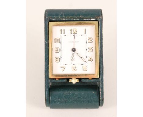 A Jaeger LeCoultre travel clock, back inscribed 'Peter from Henrietta May 23rd 1971'