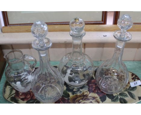 A Mary Gregory jug and decanter plus a pair of cut glass decanters