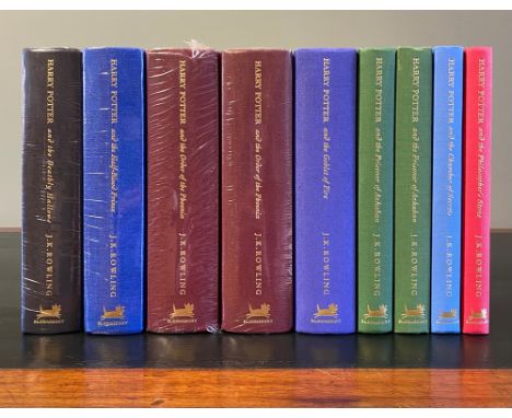 ROWLING, (J. K.). [First Deluxe Editions, Full Set, First Printings]. Harry Potter and the Philosopher's Stone, very light bu