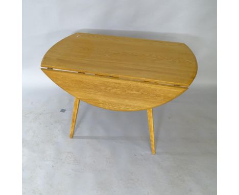 A mid-century Ercol elm drop leaf bow-end kitchen table, on tapered beech legs, 114 x 72 x 62cm 