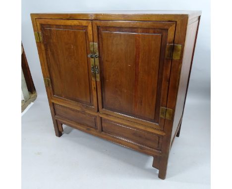 A Chinese elm two door wedding cabinet with shelf and drawer fitted interior. 119x122x63cm 