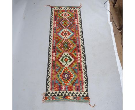 A Chobi Kilim runner. 200x65cm. 