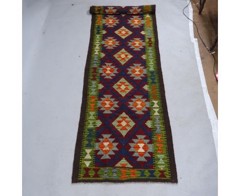 A Maimana Kilim runner. 300x80cm 