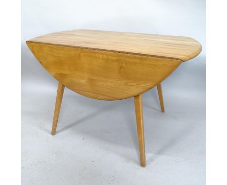 A mid-century Ercol bow-end drop leaf dining table. 113x73x61cm 