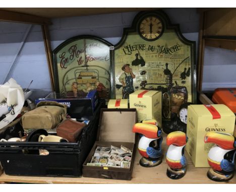 Shelf of assorted including Guinness memorabilia, cigarette cards etc.