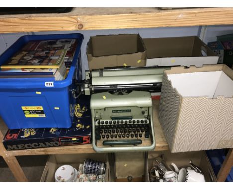 Shelf of assorted to include Meccano, typewriter etc.