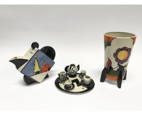 A Lorna Bailey vase and teapot and a miniature Lorna Bailey style tea service