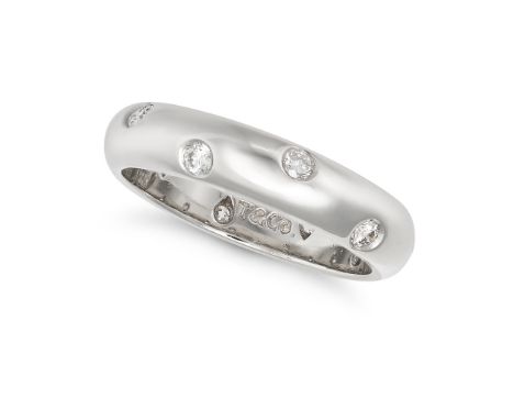 TIFFANY &amp; CO., A DIAMOND ETOILE RING in platinum, the band set with staggered round brilliant cut diamonds, signed T &amp