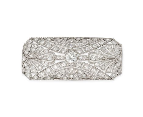 AN ART DECO DIAMOND BROOCH the openwork brooch set with a central old European cut diamond of approximately 0.72 carats accen