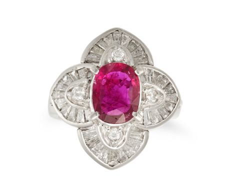 A RUBY AND DIAMOND CLUSTER RING in platinum, set with an oval cut ruby of 1.31 carats in a stylised cluster of tapered baguet