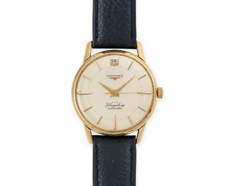 LONGINES, A VINTAGE FLAGSHIP AUTOMATIC DATE WRISTWATCH in 9ct yellow gold, circa 1960s, silver dial with gold baton hour mark