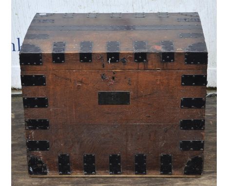 A Victorian oak silver chest, with studded metal mounts and cast iron side carrying handles, the interior with two removable 