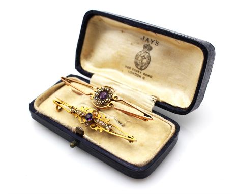 Two Edwardian brooches, including an amethyst and seed pearl foliate bar brooch with c clasp, 50x10mm, stamped 9 ct   and an 