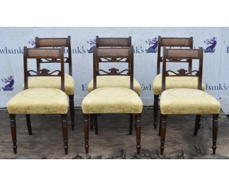 A set of six George IV mahogany dining chairs, with scroll and anthemion mid bars and ring turned legs, H 81cmCondition Repor