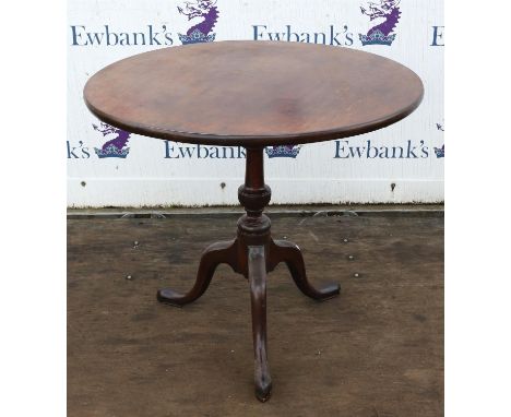 A George III mahogany tripod table, the two piece solid tilt-top on a vase turned column and cabriole legs, H 70cm, diam: 80c