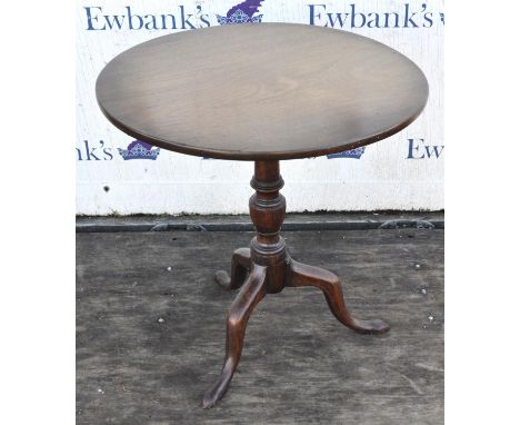 A George III mahogany tilt-top tripod table, the one piece top on a turned stem and triple cabriole legs, top re-finished, H 
