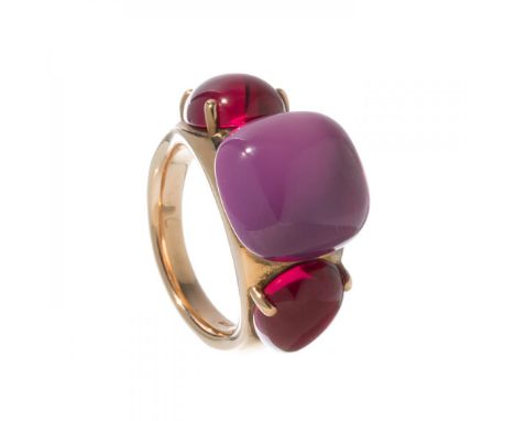 POMELLATO "Rouge Passion Collection".9kt rose gold triple ring with synthetic rubies in burma red on the sides and jungle red