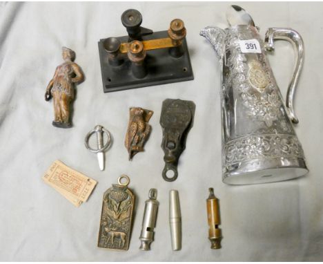 A Morse Code tapper, whistles, paper clips, door knocker, Crufts Show prize plated water jug, etc 