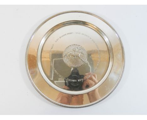 A silver plate commemorating The Irish 2,000 Guineas Derby Stakes, Irish sweep stakes etc all taking place in 1975, horse and